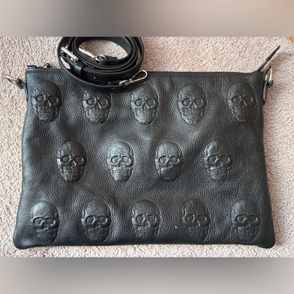 Iopelle 3D embossed skull crossbody clutch